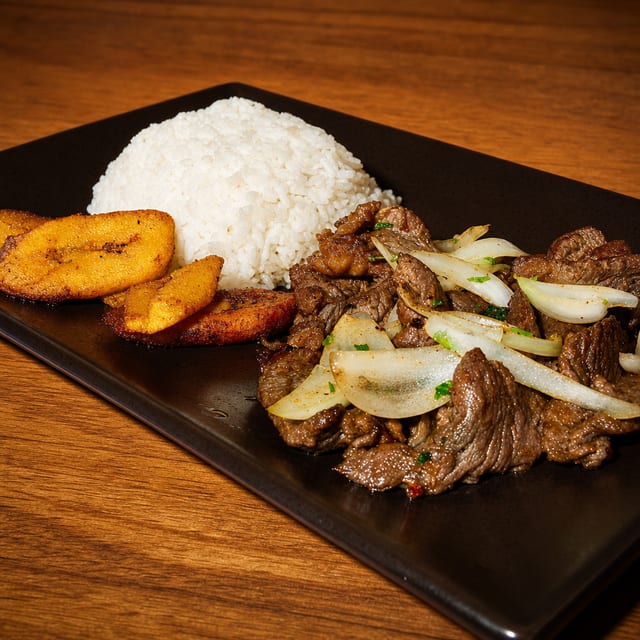 Sautéed Steak with Onions / Carne Encebollada.